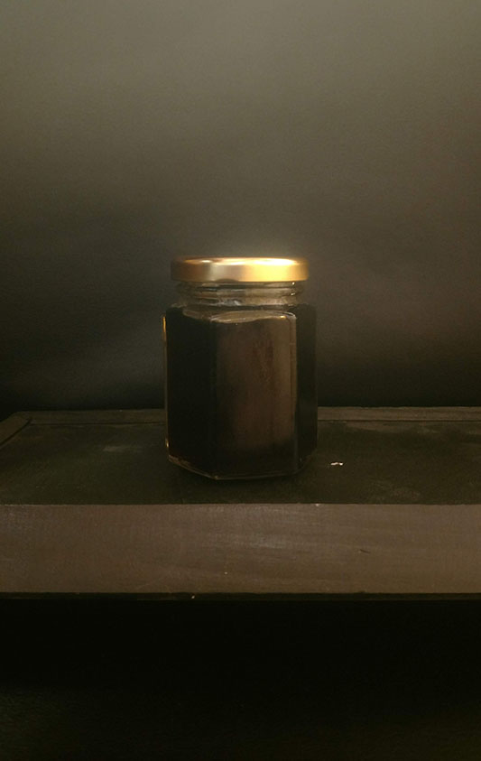 glass jar of maple jelly