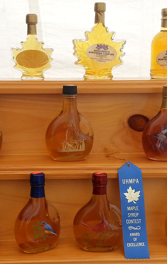 glass bottles of maple syrup